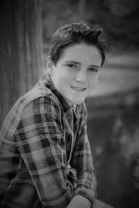 Nicholas Standing on Bridge at Park